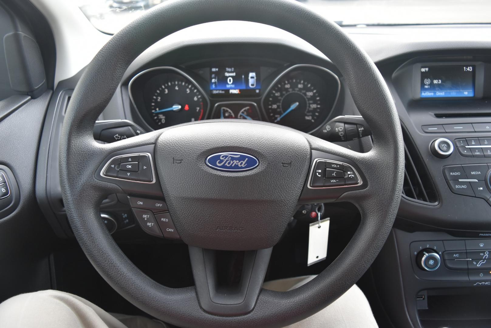 2016 Gray /Black Ford Focus SE (1FADP3F26GL) with an 2.0L I-4 GDI TI-VCT FLEX FUEL engine, 6-Speed Powershift Automatic transmission, located at 1600 E Hwy 44, Rapid City, SD, 57703, (605) 716-7878, 44.070232, -103.171410 - Photo#14